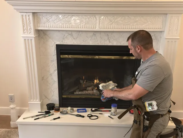 Mint Hill Chimney Sweep performing fireplace maintenance in Mint Hill, NC